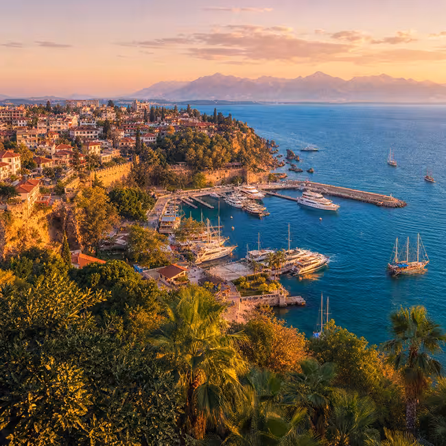 Antalya vs Istanbul dental tourism comparison - Mediterranean coastline aerial view of Antalya for UK composite bonding patients